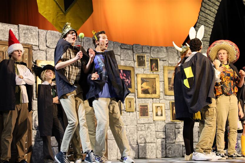 Students perform onstage
